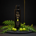 Rivaaj Mahal herbal hair oil bottle in a black and gold herbal scene