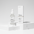 The Ordinary Niacinamide serum bottle and box in a minimal studio scene